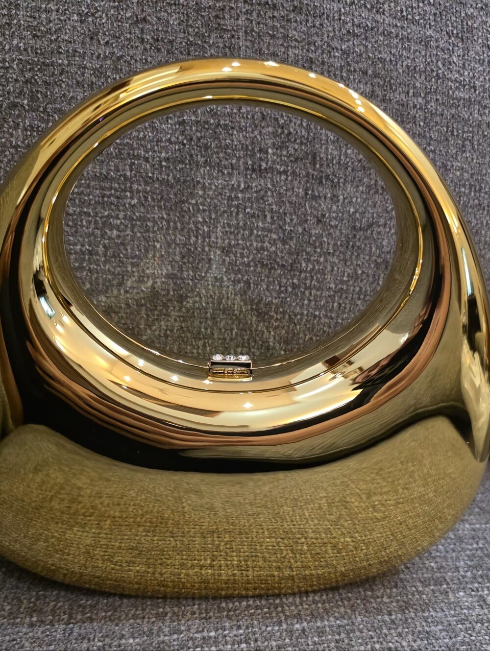 Crossi New York Gold Metallic Oval Handbag with Top Handle